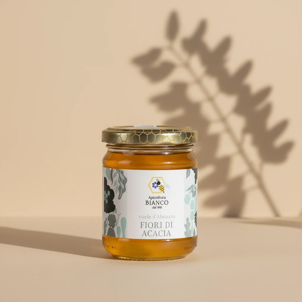 Jar of honey with a decorative label on a artistic background