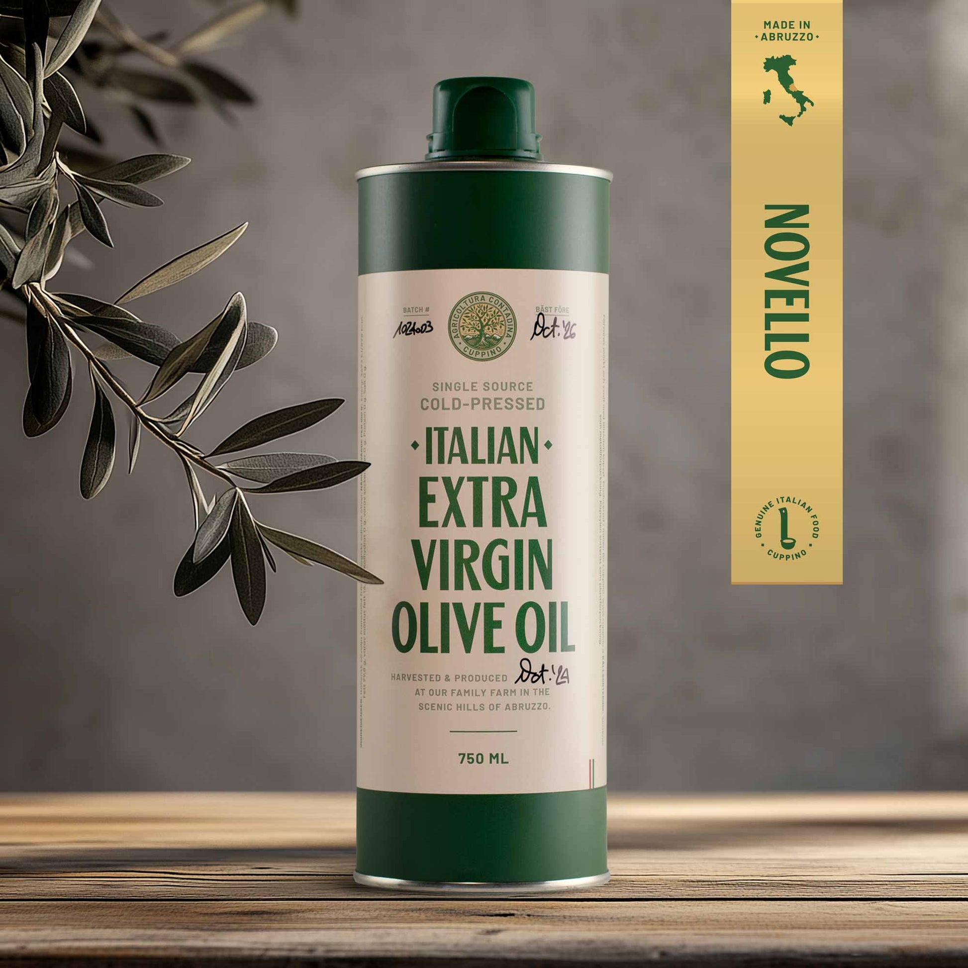 A 750ml bottle of Italian Extra Virgin Olive Oil with a green cap, placed on a wooden surface with an olive branch in the background.